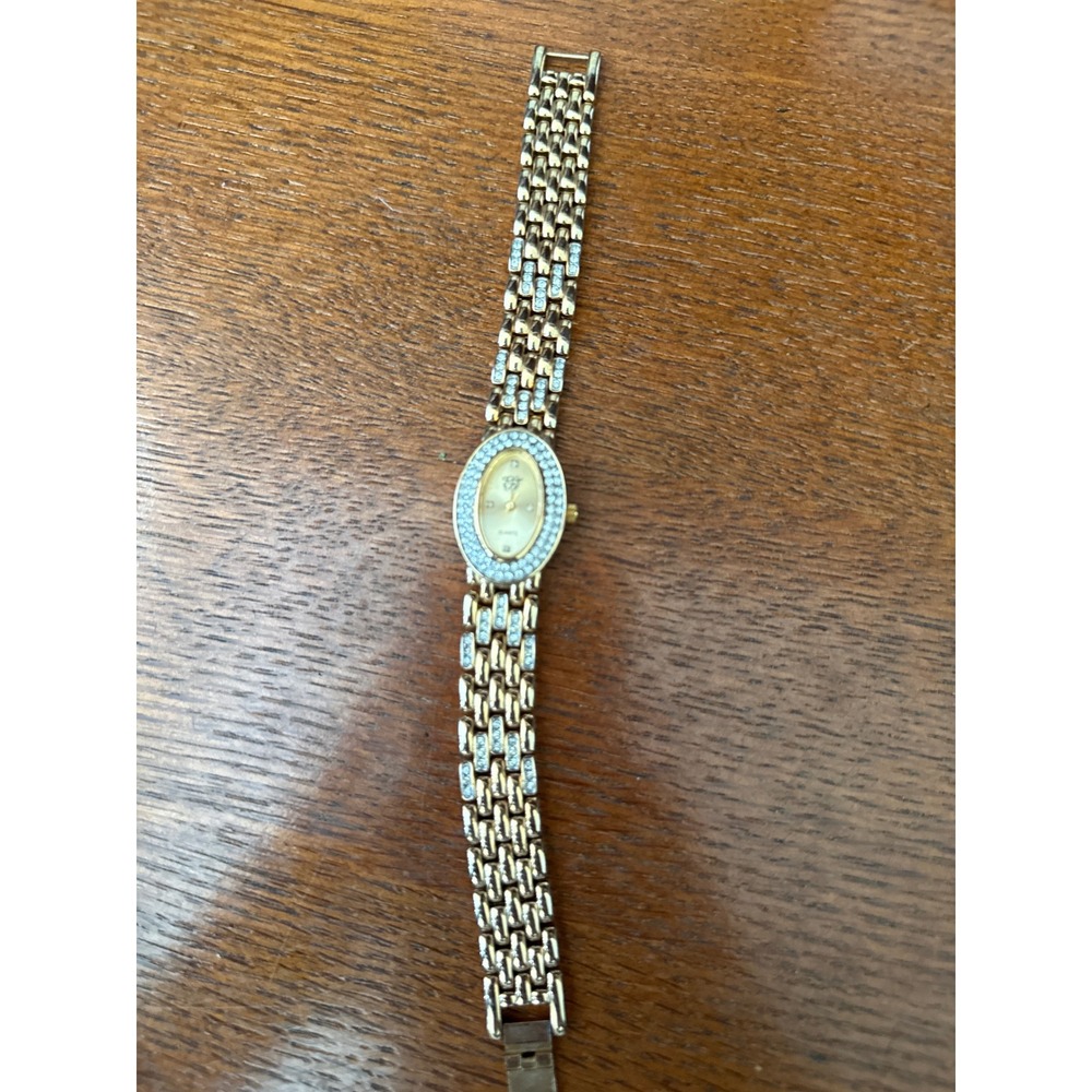 Elizabeth Taylor White Diamond Gold Tone‎ Oval Rhinestone Bezel Dress Watch